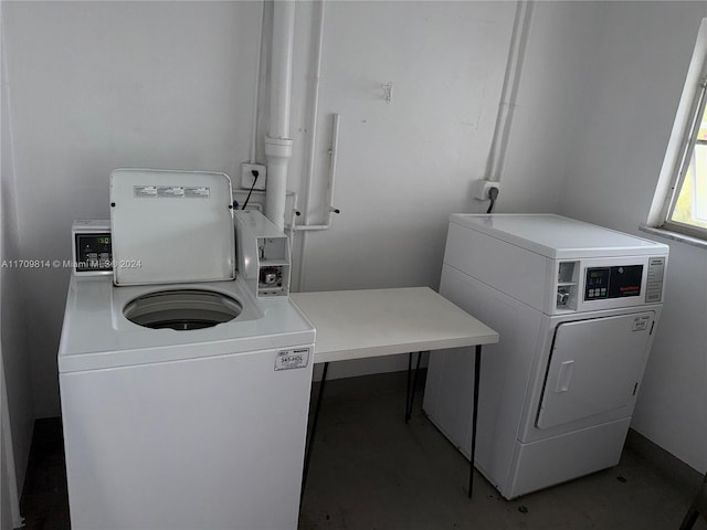 laundry area with washer and clothes dryer