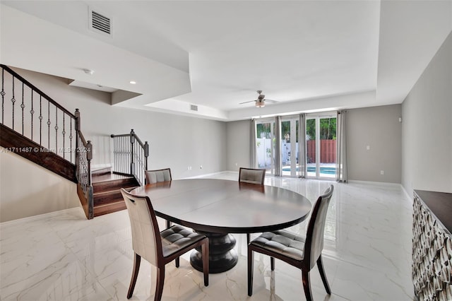 dining space featuring ceiling fan