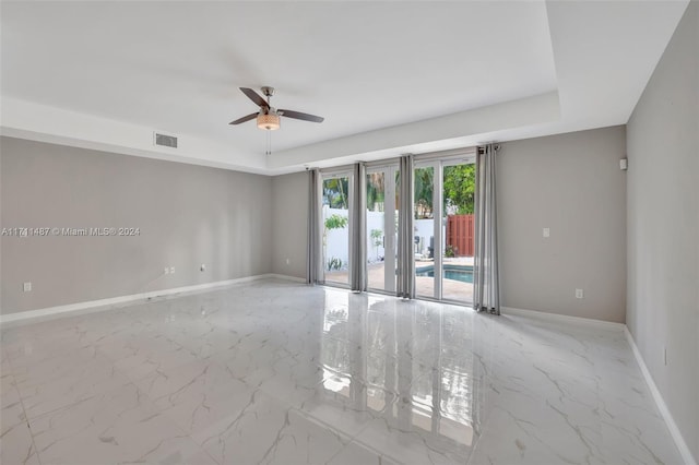 unfurnished room featuring ceiling fan