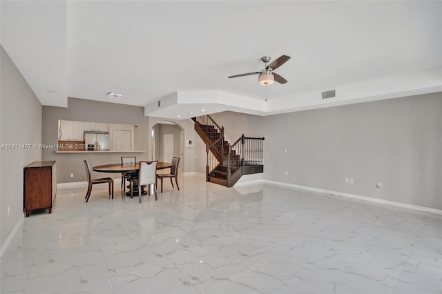 dining area with ceiling fan