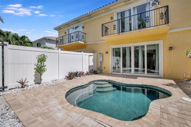 view of pool featuring a patio