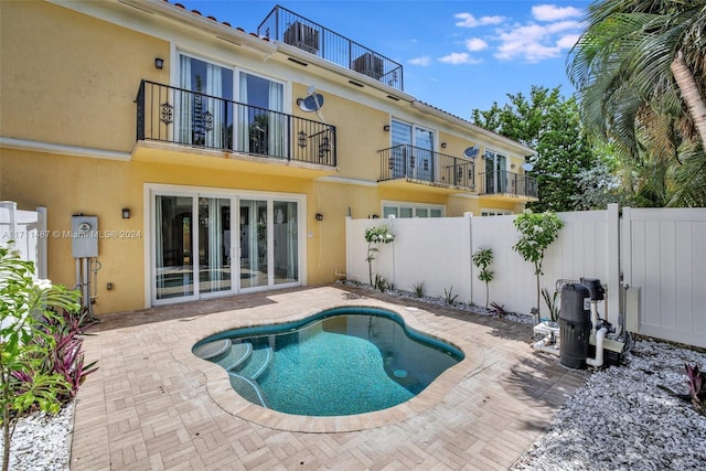 view of pool featuring a patio area