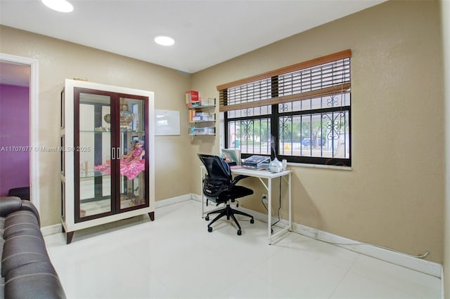 office area featuring recessed lighting and baseboards