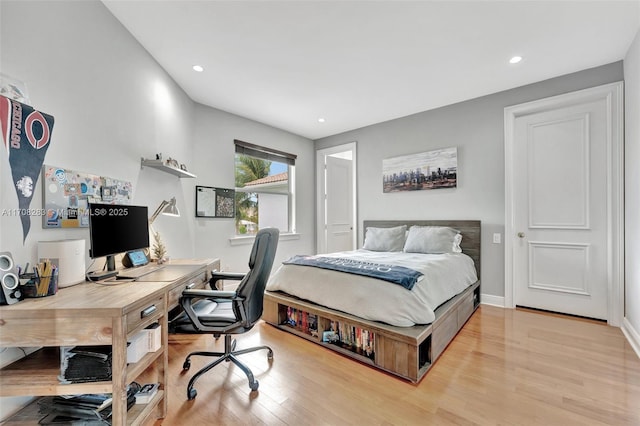 bedroom featuring light wood-style floors, baseboards, and recessed lighting