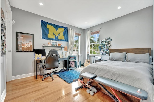 bedroom featuring wood-type flooring