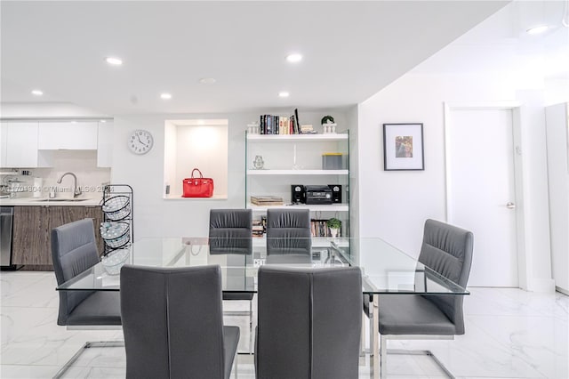 dining area featuring sink