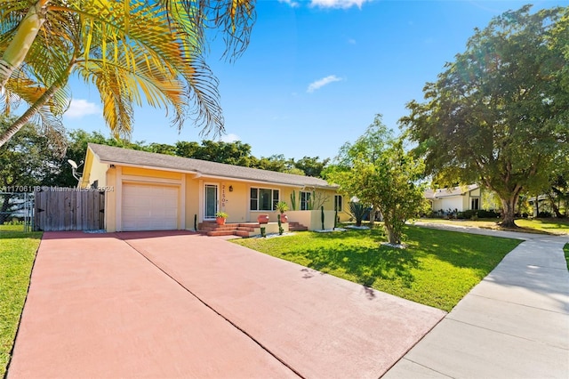 ranch-style home featuring a garage and a front lawn