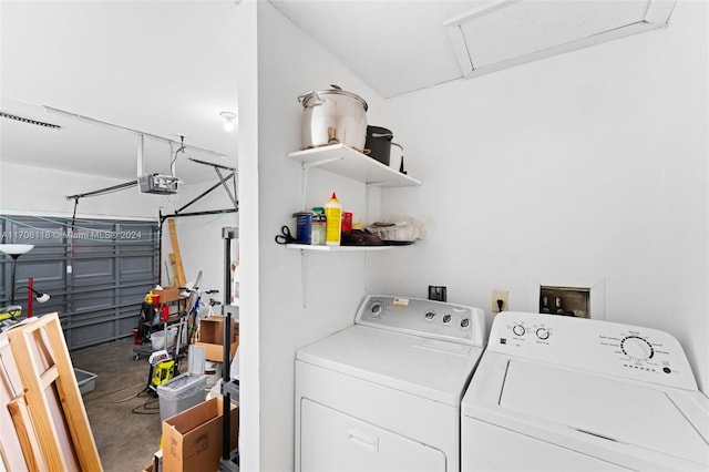 clothes washing area with washing machine and clothes dryer