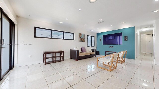 16313 SW 99th Pl, Miami, FL 33157 - living area featuring light tile patterned floors, recessed lighting, and visible vents
