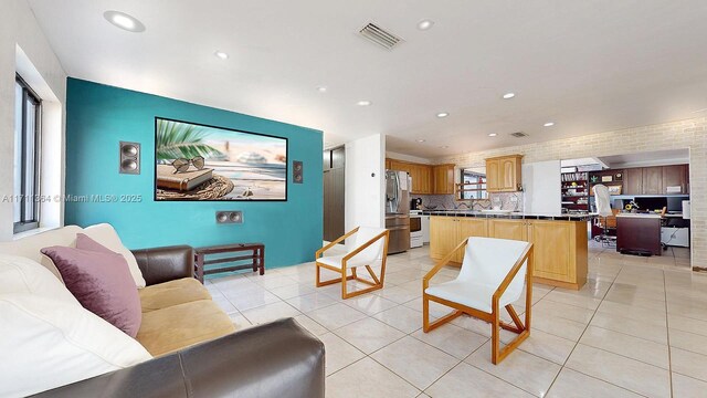 living room with light tile patterned floors