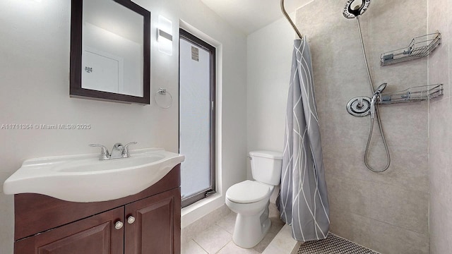 bathroom with tile patterned flooring, vanity, toilet, and a shower with shower curtain