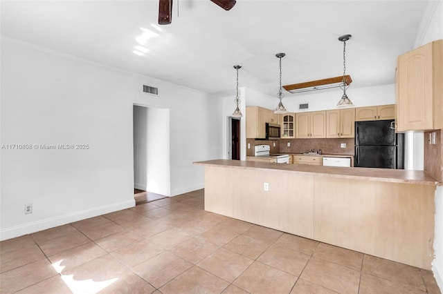 kitchen featuring black refrigerator, pendant lighting, decorative backsplash, white electric range oven, and light tile patterned floors