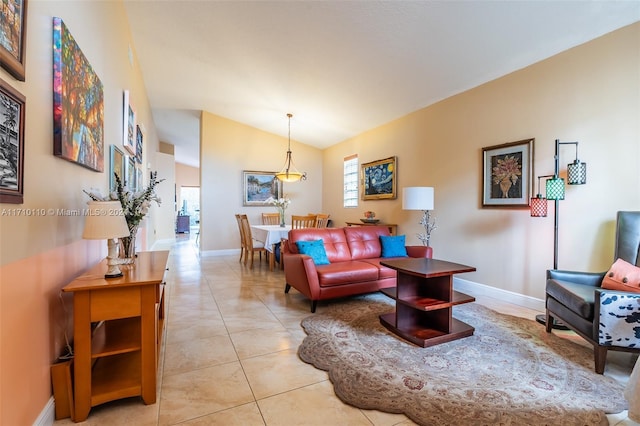 living room featuring light tile patterned flooring and lofted ceiling