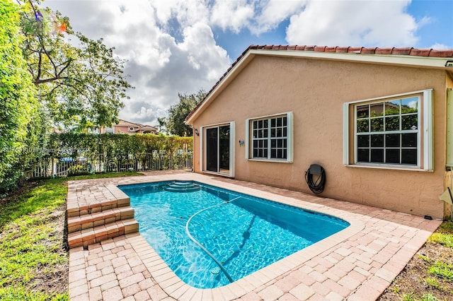 view of pool with a patio area