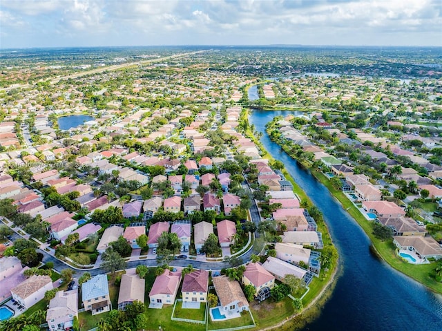 drone / aerial view featuring a water view