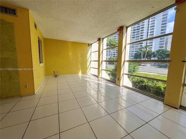 unfurnished sunroom with a healthy amount of sunlight