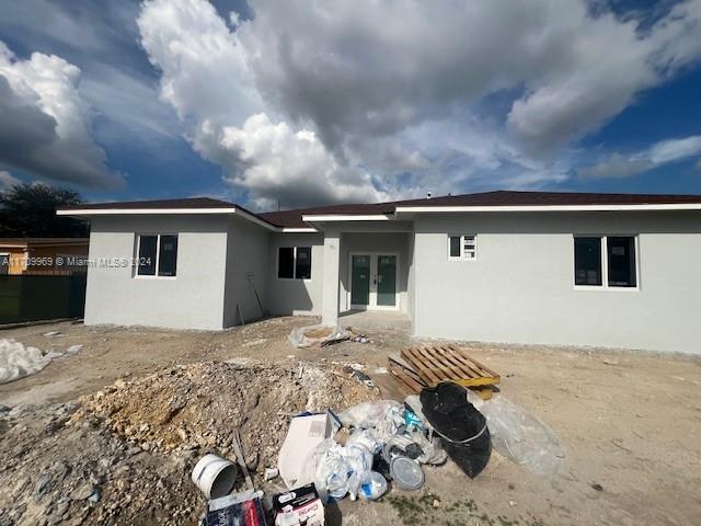 back of house with french doors