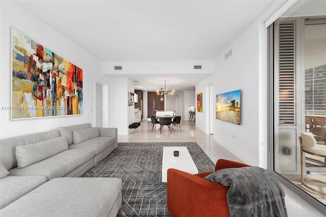 living room featuring a chandelier