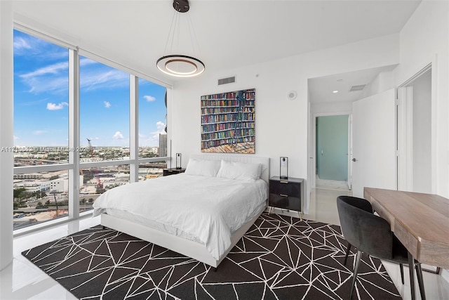 bedroom featuring expansive windows