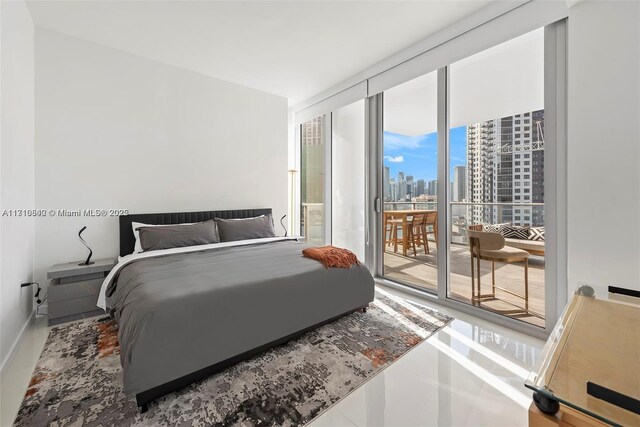 bedroom featuring a wall of windows