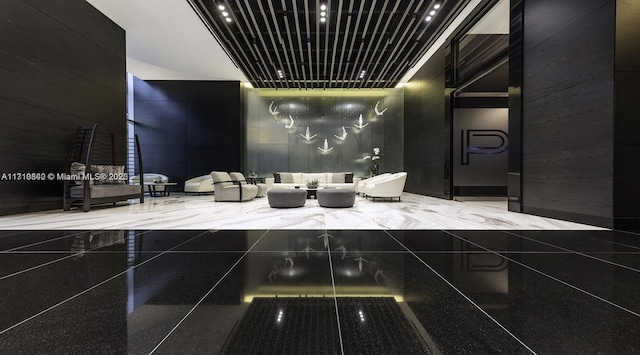 bathroom featuring a high ceiling