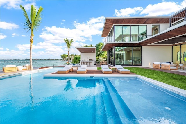 view of pool featuring a water view