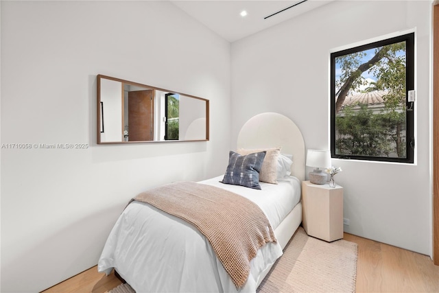 bedroom featuring light hardwood / wood-style floors