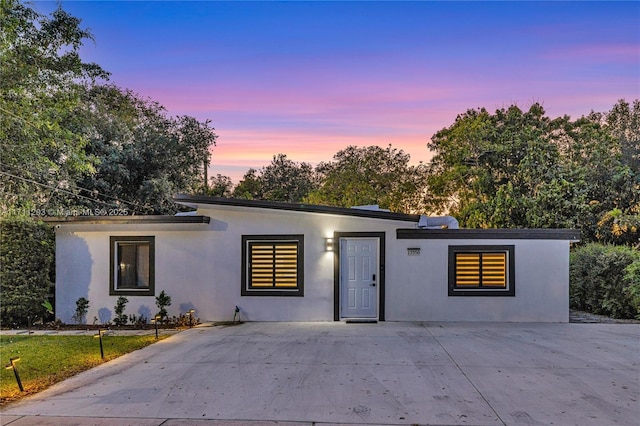 view of front of home featuring stucco siding