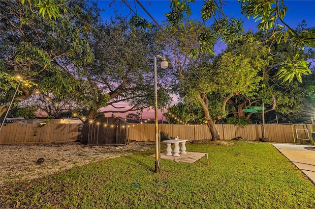 view of yard featuring a fenced backyard