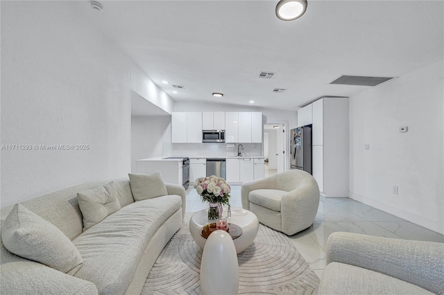living room featuring visible vents, baseboards, recessed lighting, and marble finish floor