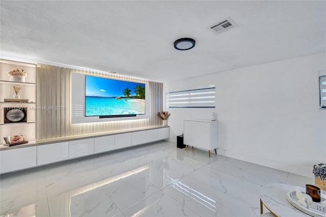 unfurnished living room featuring marble finish floor and visible vents