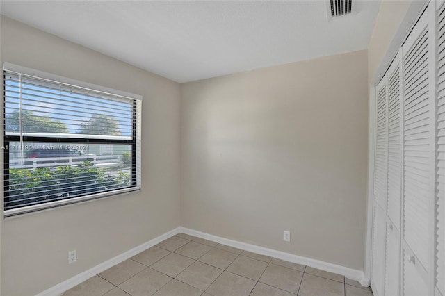 view of tiled empty room