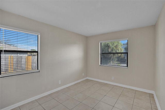 view of tiled spare room