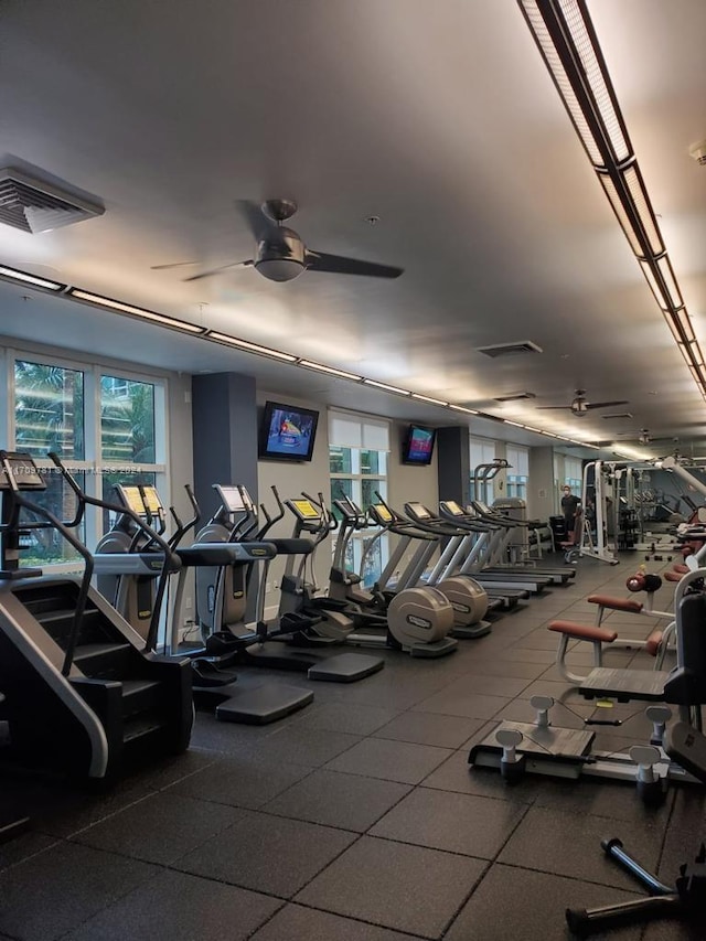 workout area with ceiling fan