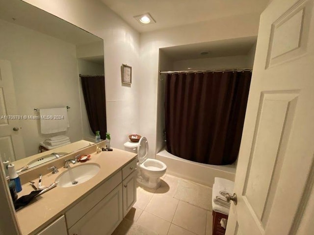 full bathroom with tile patterned floors, vanity, toilet, and shower / bathtub combination with curtain