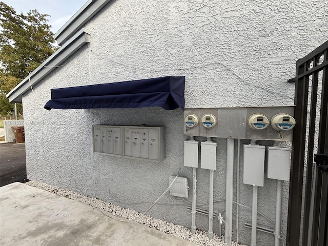 exterior details featuring a mail area