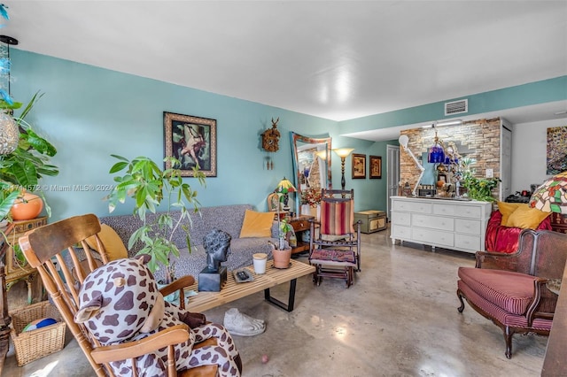 living room featuring concrete floors