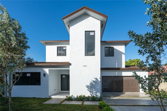 exterior space with a garage