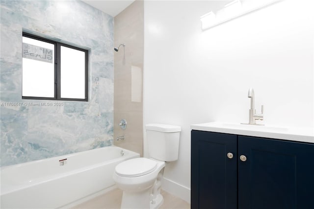 full bathroom featuring toilet, baseboards, shower / washtub combination, and vanity