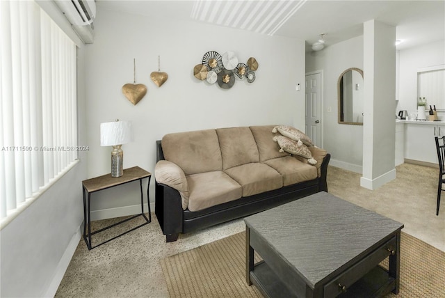 living room with a wall unit AC