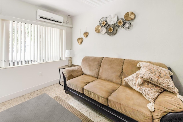 living room with a wall mounted air conditioner and baseboards