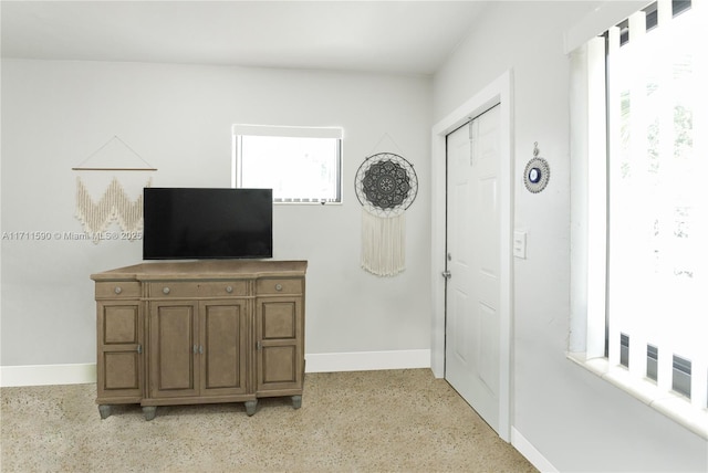 foyer entrance with baseboards