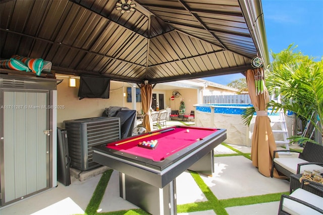 playroom with lofted ceiling and pool table