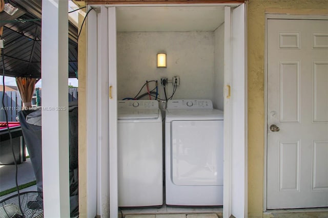 laundry room featuring washer and dryer