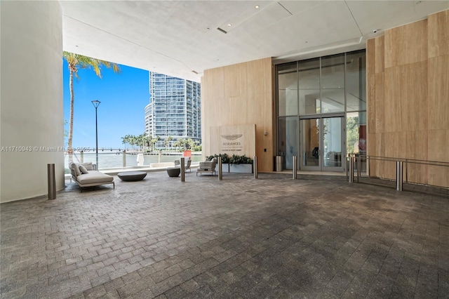 building lobby featuring a water view