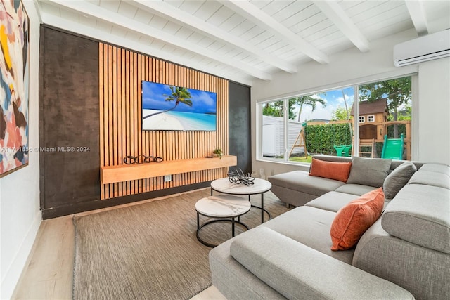 interior space with wood-type flooring, a wall unit AC, wood ceiling, and beam ceiling