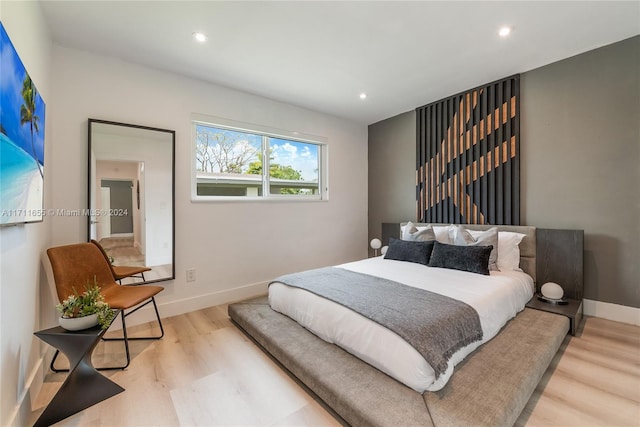 bedroom featuring light hardwood / wood-style floors