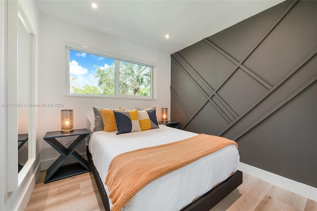 bedroom featuring light hardwood / wood-style floors