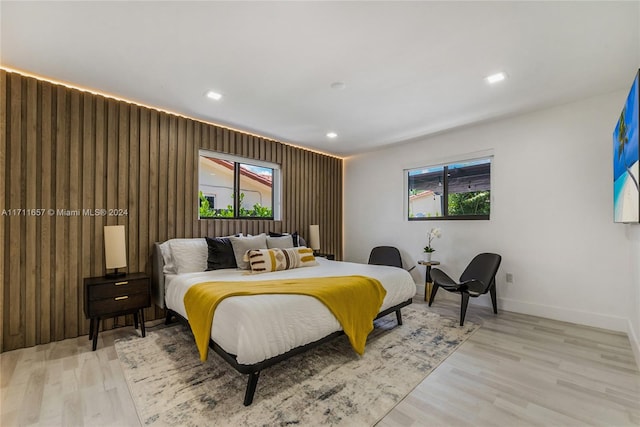 bedroom with light wood-type flooring