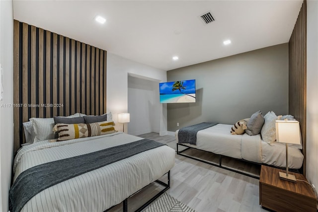 bedroom with light wood-type flooring